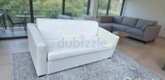 Natuzzi two seater sofa bed with mattress