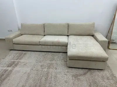 Kivik  Beige L-shaped sectional sofa with chaise -