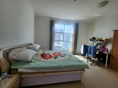 A prime investment opportunity: a spacious 855 sq ft one-bedroom apartment for sale in City Towers, Ajman, boasting unobstructed views of the palace a