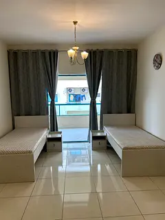 EXECUTIVE BEDSPACE WITH HUGE BALCONY AND SEPARATE WASHROOM NEAR BURJUMAN METRO