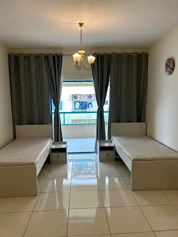 EXECUTIVE BEDSPACE WITH HUGE BALCONY AND SEPARATE WASHROOM NEAR BURJUMAN METRO