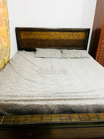 King Size Bed with Elegant Headboard