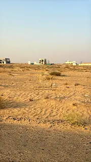 Two adjacent plots of land for sale in Al Sahma area, Al Ruwaidat suburb. Each plot is 3000 sq ft.