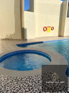 2-bedroom apartment with living room in Emirates City, 2 bathrooms, master room, built-in wardrobes,
