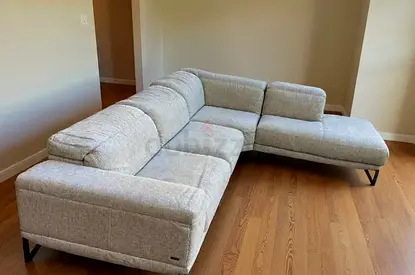 Almost like a new condition Natuzzi L shape sofa