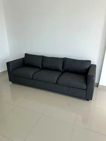 Modern 3 seater sofa, dark grey color. Very comfortable and stylish design. Good quality fabric and
