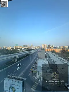2BR in Al Nuaimiya 3: 1 master, 2 baths, balcony w/ open view, spacious hall, central AC, near all s