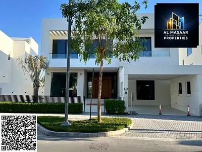 Villa for sale in Al Zorah, golf course complex, in the heart of nature, with a direct view of the lake and golf courses and a large area.