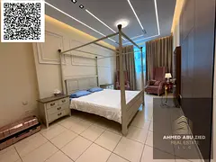 Beautiful 2-bedroom apartment in Ajman for yearly rent, 2 master rooms, 3 bathrooms, balcony with op