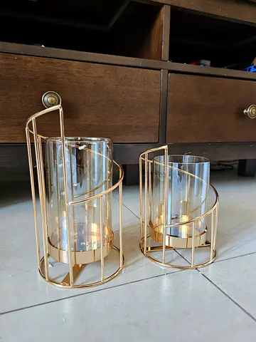 Elegant Glass Candle Holders with Gold Frames.
