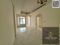 Luxury 2BR+hall+majlis in Al Tilla, annual rent. Spacious rooms, built-in wardrobes, open-view balco