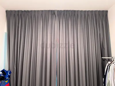 Grey floor-to-ceiling blackout curtains - good condition