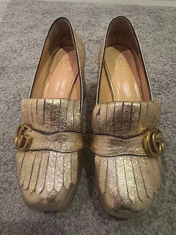 Gucci metallic gold leather fringe loafers (womens) size 39