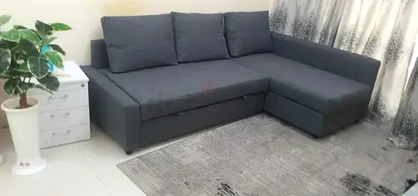 Grey L-shaped Fabric Sofa bed with Chaise - Good Condition