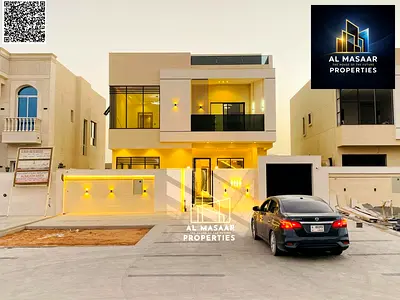Luxury villa with a modern design for sale on the main street, two floors and a roof, with a 12-meter front setback in Al Zahiyah area, Ajman