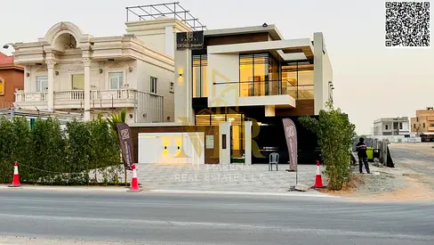 Villa for sale, all-inclusive (electricity, water, and air conditioning), on the main street, ready to move in, in one of Ajman's most prestigious are