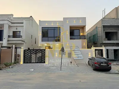Villa for sale in Ajman | Al Amrah area | 5 bedrooms, living room, majlis, and swimming pool | Freehold for all nationalities | Price includes registr