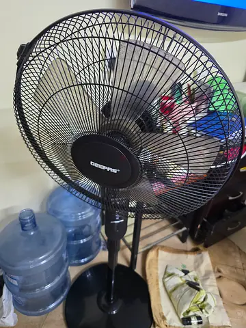 Black adjustable pedestal fan - working condition