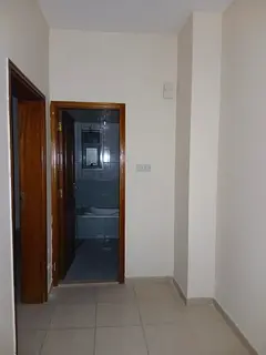 Spacious and clean room and living room in Al Nuaimiya 1. Excellent location with comprehensive serv