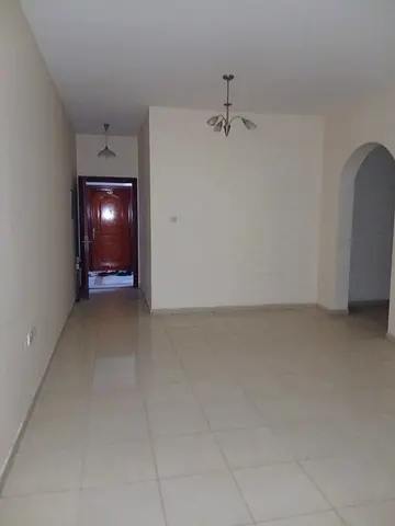 Spacious and clean room and living room in Al Nuaimiya 1. Excellent location with comprehensive services.