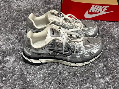 Nike p6000 metallic silver shoes