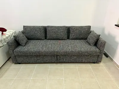 Grey color 3 Seater Sofa Bed. Good condition, neat and clean fabric, perfect for home use.