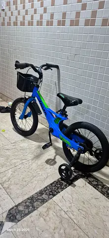 Kids Blue Bicycle with Front Basket, good condition, slightly used, ready for pickup