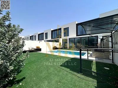 A villa with all-inclusive price (electricity, water, and air conditioning) on ​​the main street, ready to move in, in one of Ajman's most prestigious