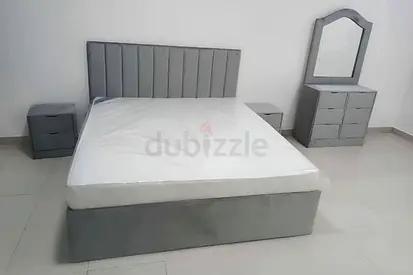 Modern Grey Bed with Nightstands and Dresser