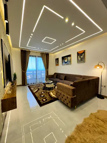Furnished 2BR apartment in Ajman Marina Walk, full sea view, bills, internet, parking & gym included.