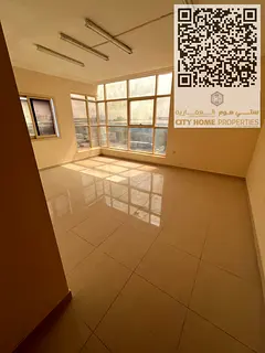 Annual apartment for rent in Al Jurf 2, Ajman with a large space and clean finishing Central AC + bu