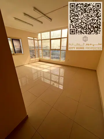 Annual apartment for rent in Al Jurf 2, Ajman with a large space and clean finishing Central AC + built-in wardrobes + prime location near Al Aqsa Sch