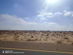 For Sale: Two Adjoining Plots in Al Sahmah – Second Row, Close to Main Road
