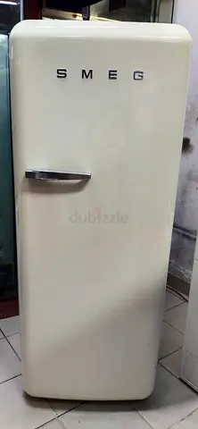 Smeg is a 50s Retro Style single-door refrigerator in a cream finish,