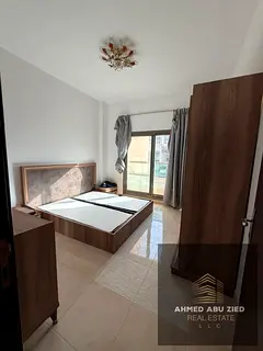 Three bedrooms and a living room for annual rent in Emirates City on Sheikh Mohammed Bin Zayed Road,