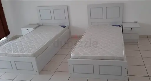 White Twin Beds with Nightstand