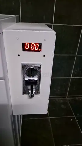 Coin-operated washer/dryer unit with digital timer and coin box