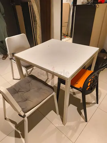 Simple Dining Table with Four Chairs
