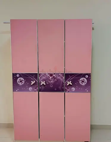 Stylish pink wardrobe with floral design  storage