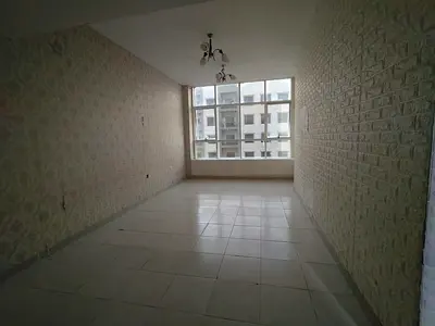 Spacious 2-bedroom apartment with living room for sale in Garden City Towers, 1142 sqft, with private parking inside the tower, priced at AED 425,000