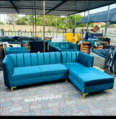 Teal velvet L-shaped sectional sofa with channel back and gold legs