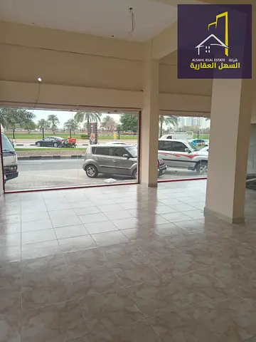 معرض تجاري بميزانين للإيجار على شارع جمال عبد الناصر