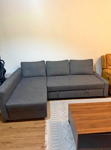 Ikea L Shape Sofa cum bed with big storage in L