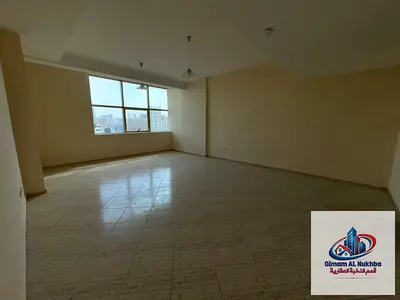 Apartment 2BR hall in Al Majaz 2, 2 bathrooms, free AC, gym & pool included, near walking track & parks, daily needs available in building.