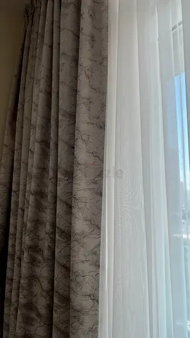 Beige patterned blackout curtains with white sheer voiles — set (used, good condition)