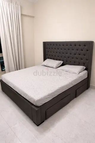 Stylish Gray Upholstered Bed with Storage | AED 1100