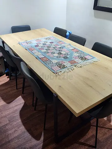 Stylish 8 seaters Dining Table with grey leathered chairs