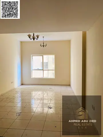 1BR hall first tenant in Emirates City on Sheikh Mohammed Bin Zayed Rd, master, 2 baths, balcony, central AC, cheque security, prime location, easy ac