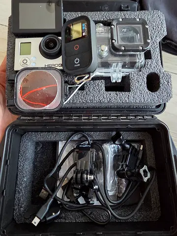 GoPro Hero 3 action camera bundle with waterproof case, remote and mounts