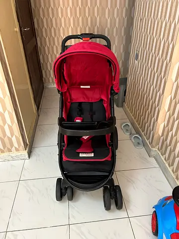 Compact and Stylish Red Stroller